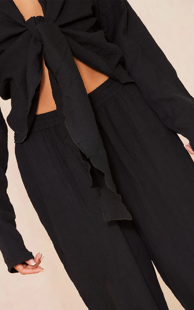 Pantalon large noir en étamine texturée