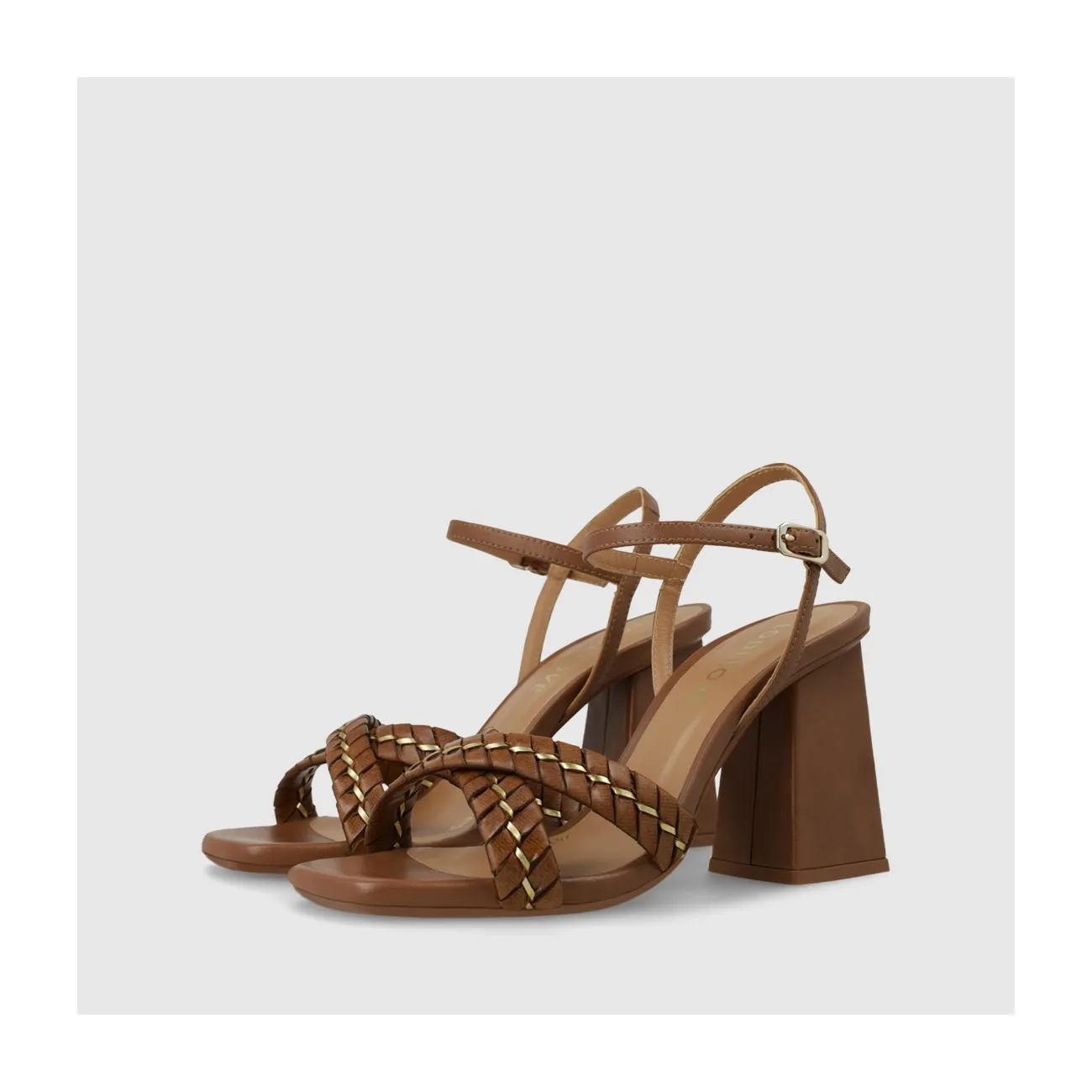 Sandale pour femme en cuir couleur cuir avec brides tressées. I LODI Chaussures pour femme online.